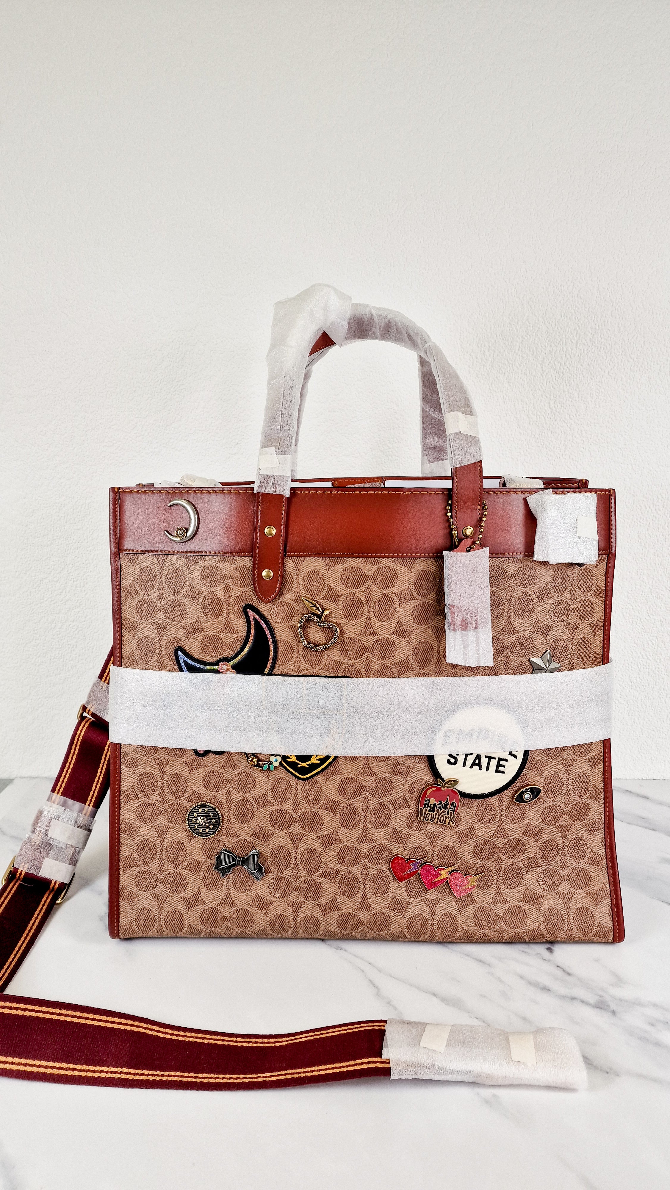 Field Tote 40 in Signature Canvas with Souvenir Patches and Pins Empire State Rexy - Tan Rust Saddle Brown Shoulder Bag Crossbody - Coach C0768 - Image 2