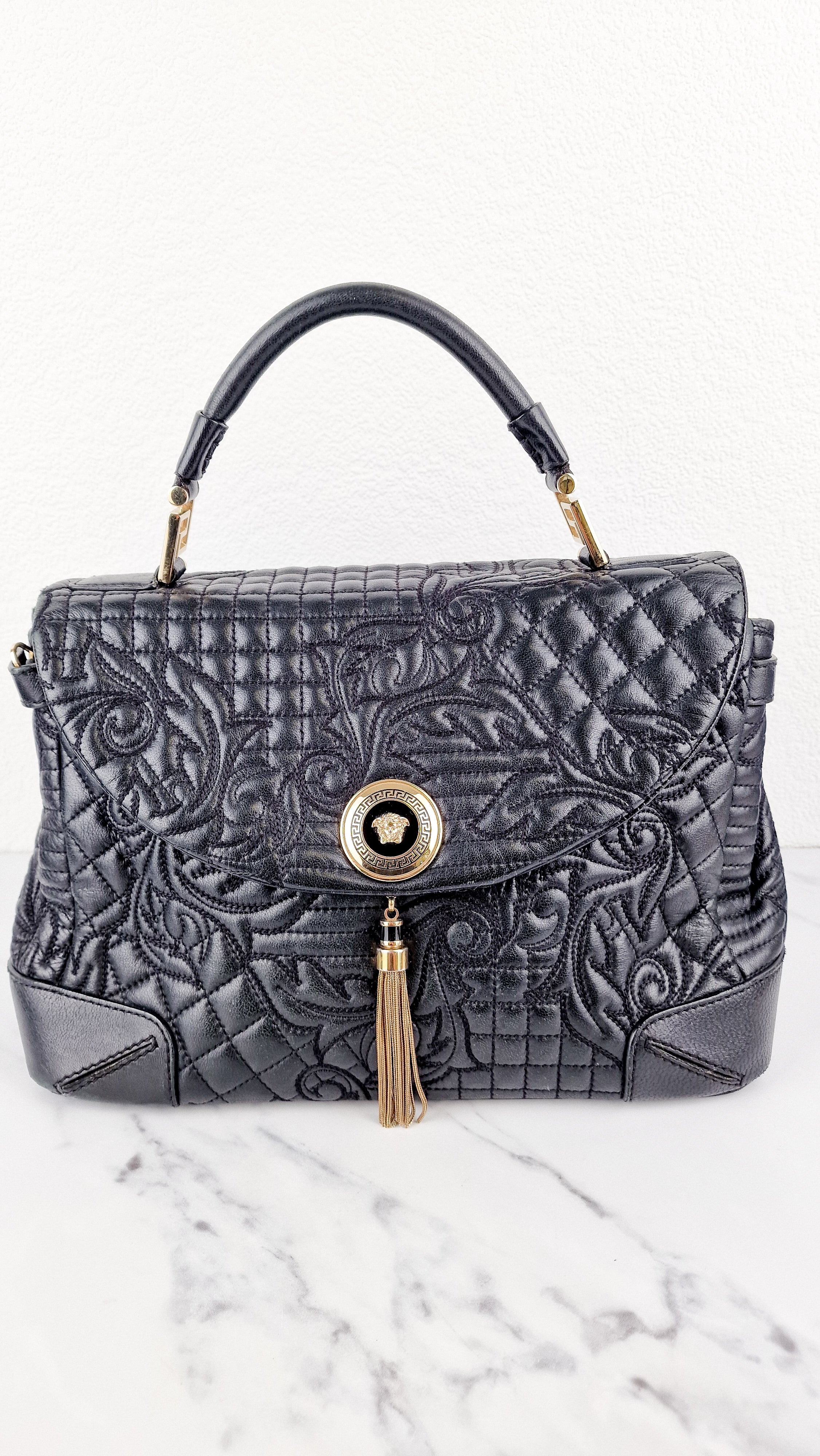 Versace Vanitas Altea Baroque Quilted Leather Black Handbag with Medusa Tassel
